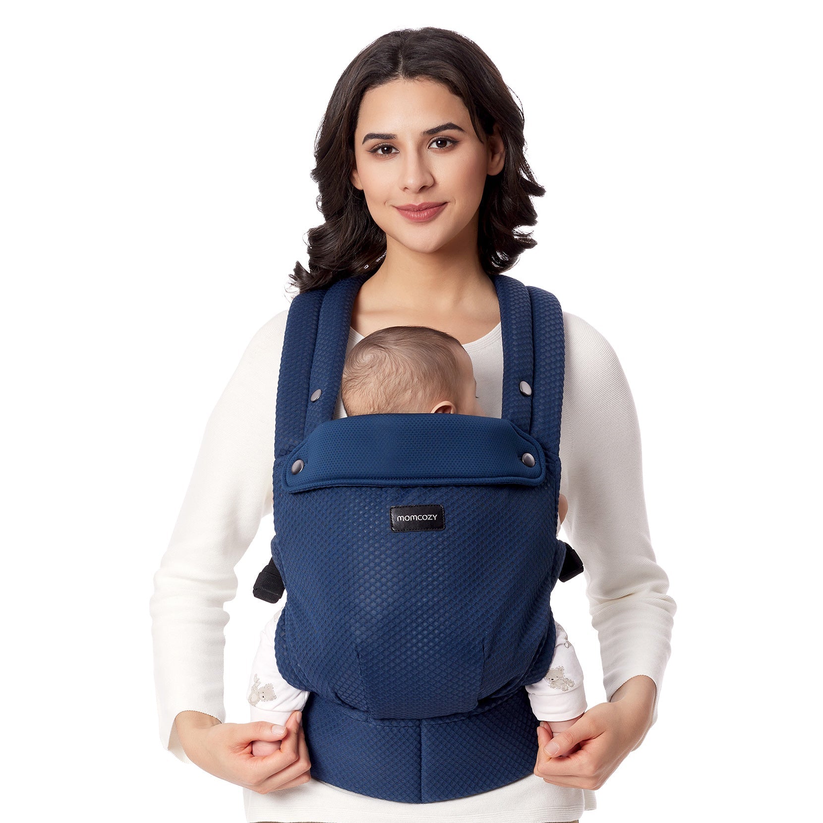 Momcozy PureHug baby carrier in navy blue, worn by mother with baby, featuring ergonomic design for comfortable babywearing