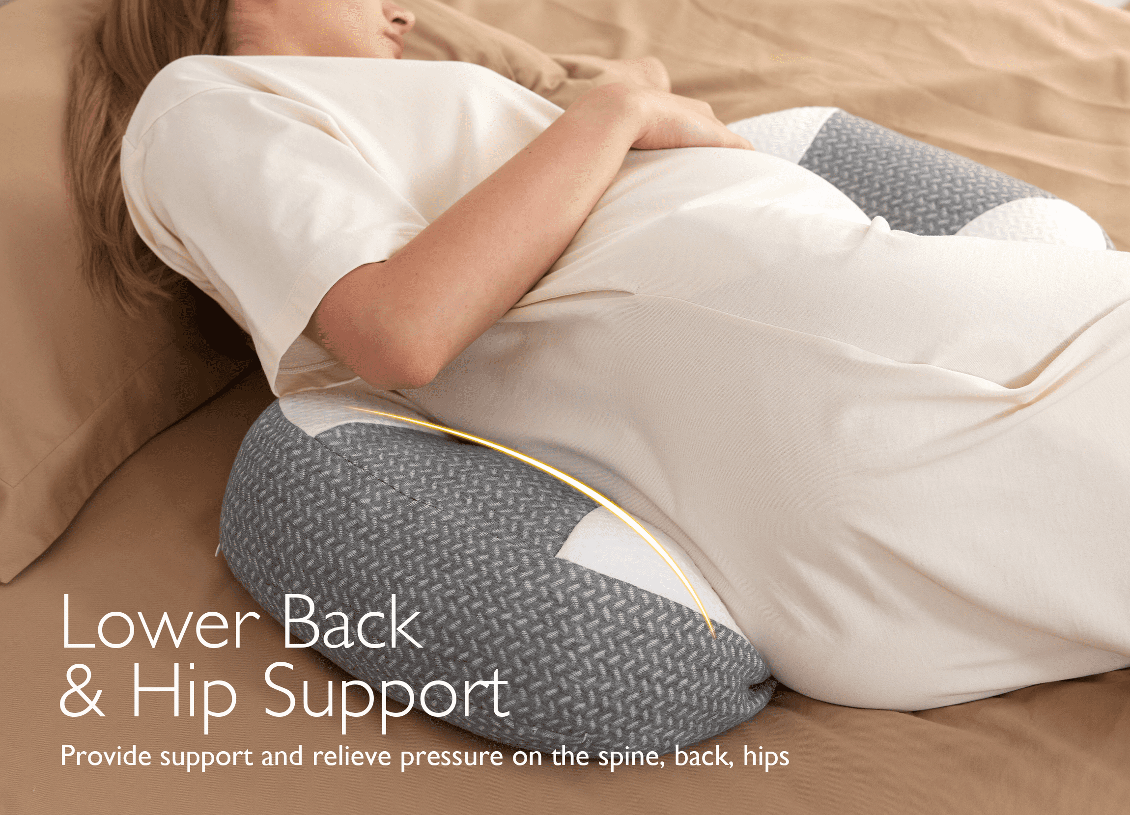 Pregnant woman resting on a grey Pregnancy Wedge Pillow with Cooling Cover providing lower back and hip support.