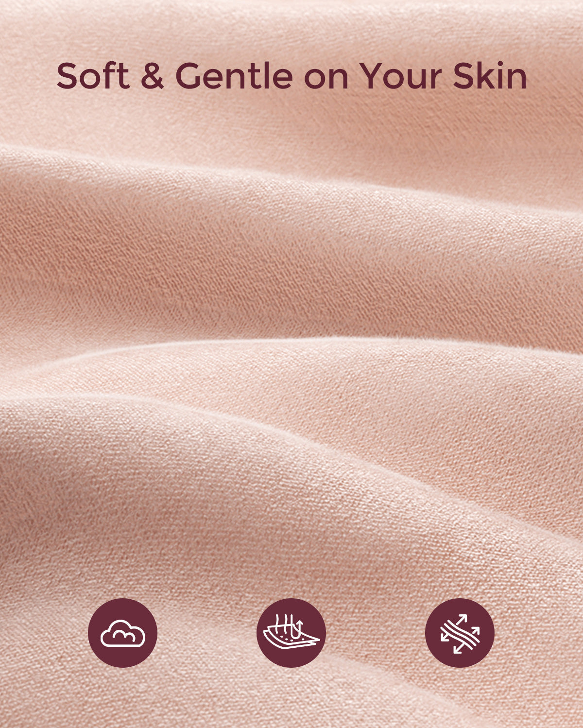 Close-up of soft, peachy-pink BumpEase maternity band fabric showcasing cloud-like softness, breathability, and stretch.