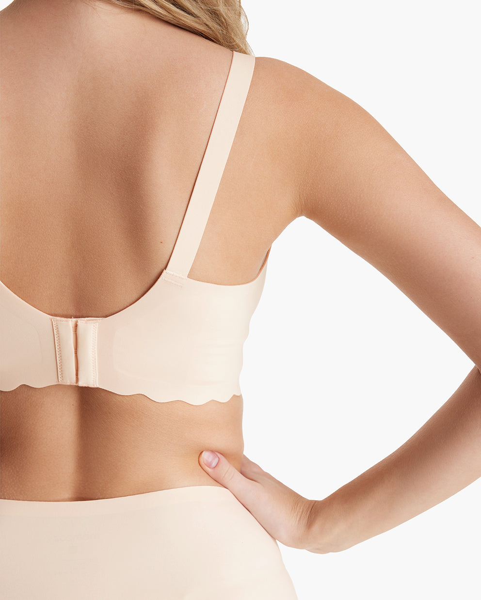 Adjustable hook-and-eye & scalloped band of beige Jelly Strip Seamless Nursing Bra YN46, rear view for M9 Pump.