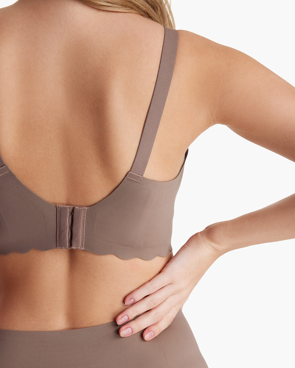 Rear view: Taupe Seamless Jelly Strip Nursing Bra YN46, with adjustable straps, hook-and-eye, scalloped band. M9 Pump.